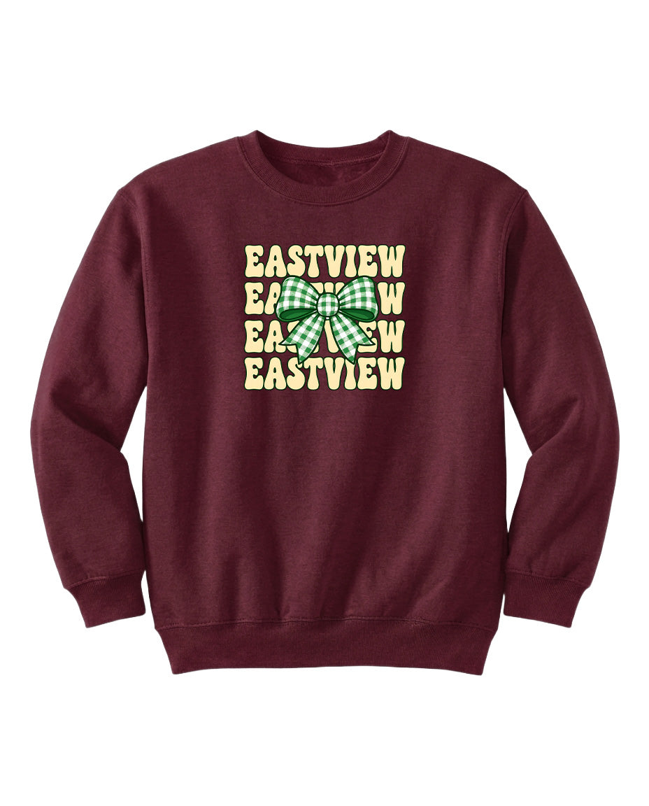 A burgundy sweatshirt with a graphic design featuring the text "EASTVIEW" repeated in a vertical pattern, with a green bow below the text.