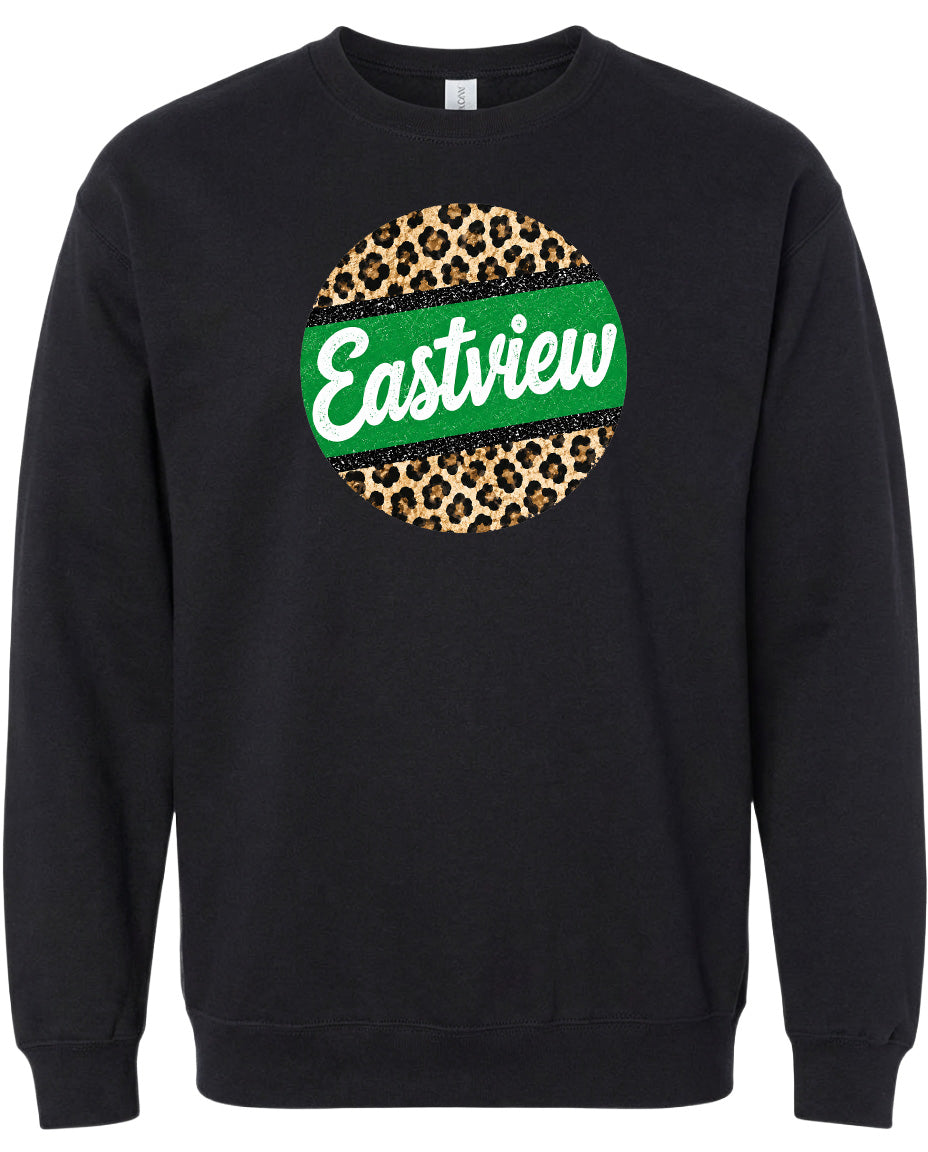 A black sweatshirt with a circular design featuring a leopard print pattern and the word "Eastview" written in white text.