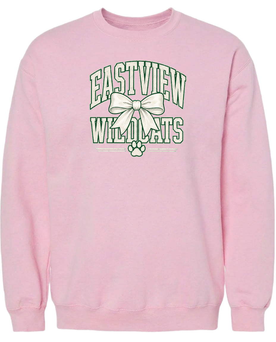A pink sweatshirt with a graphic design featuring the text "EASTVIEW WILDLIFE" and a bow.