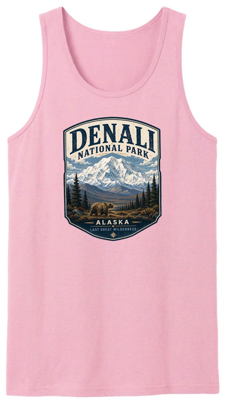 A pink tank top with a graphic design featuring a bear and mountains, along with the text "DENALI NATIONAL PARK ALASKA LAST GREAT WILDERNESS".