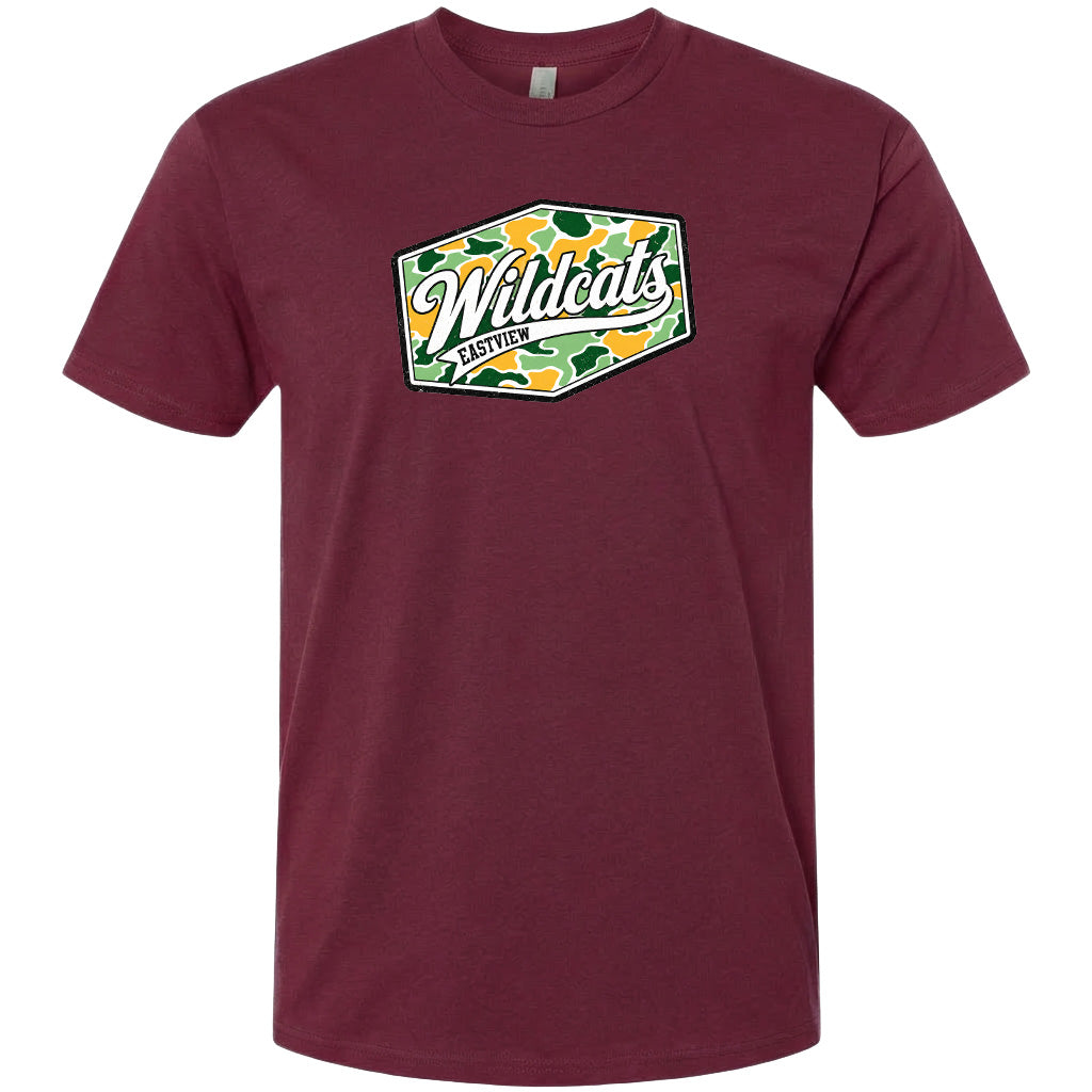 A burgundy-colored t-shirt with a graphic design featuring the word "Wildcats" in a stylized font.