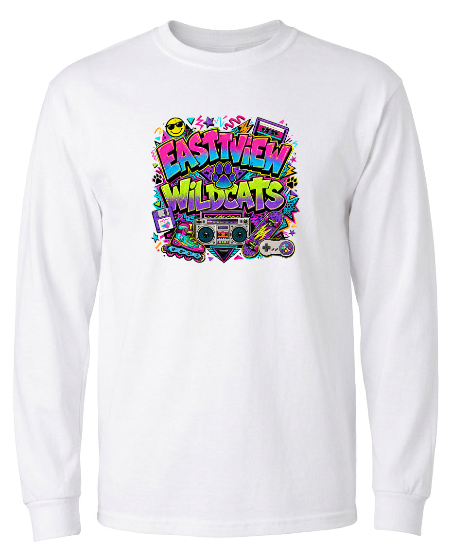 A white long-sleeved t-shirt with a colorful graphic design featuring the text "EASTVIEW WILDCATS" surrounded by various icons and elements, such as a boombox, skateboard, and other retro-style objects.