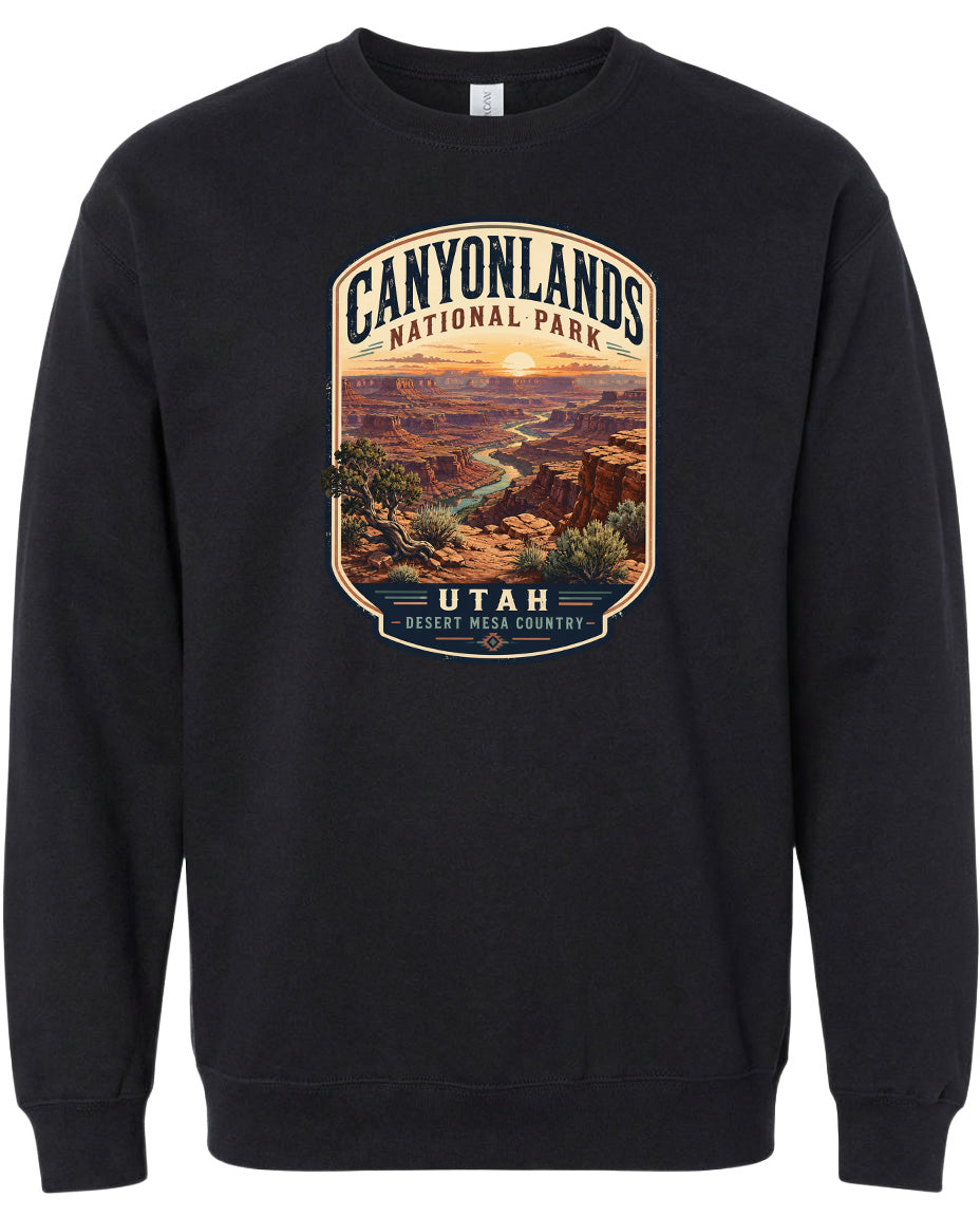 A black sweatshirt with a graphic design depicting the scenic landscape of Canyonlands National Park in Utah.