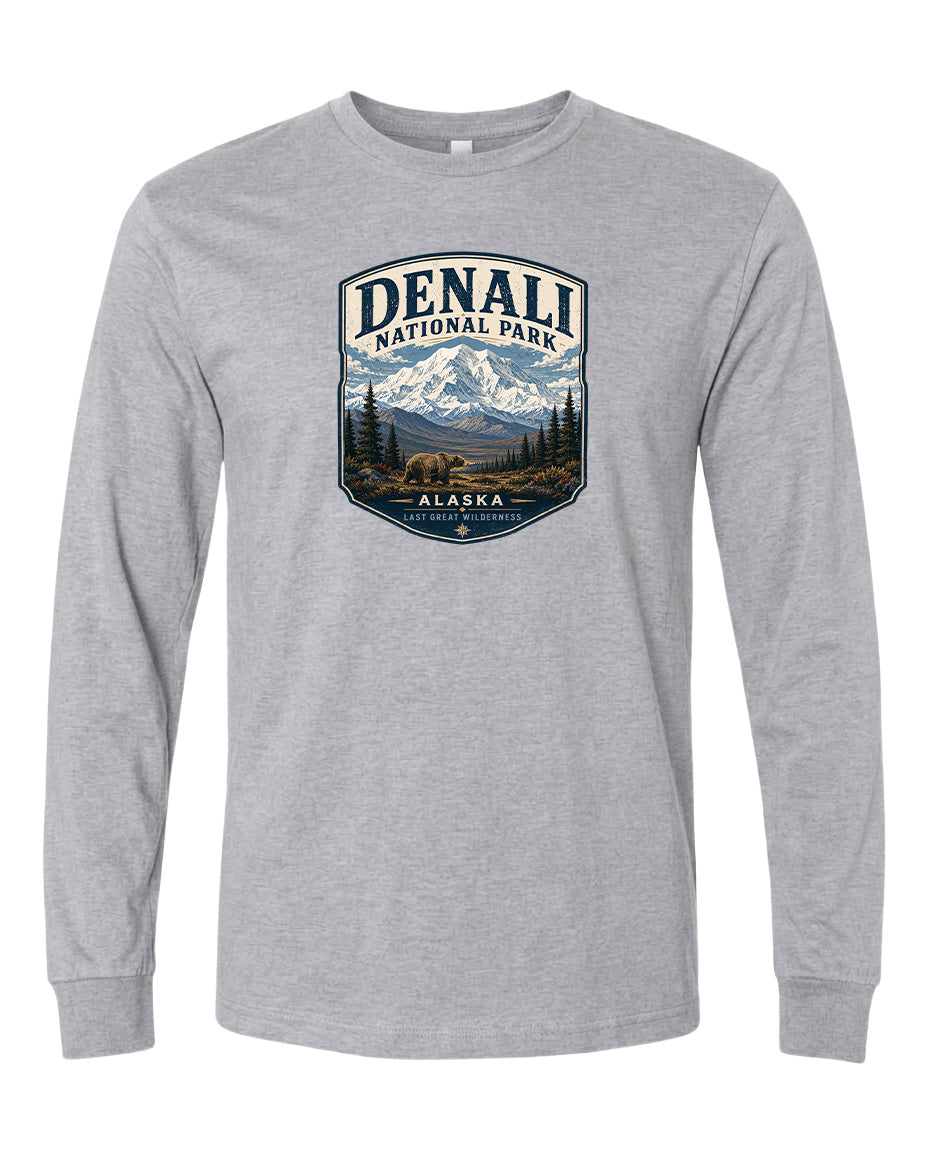 A gray long-sleeved t-shirt with a graphic design depicting Denali National Park in Alaska.