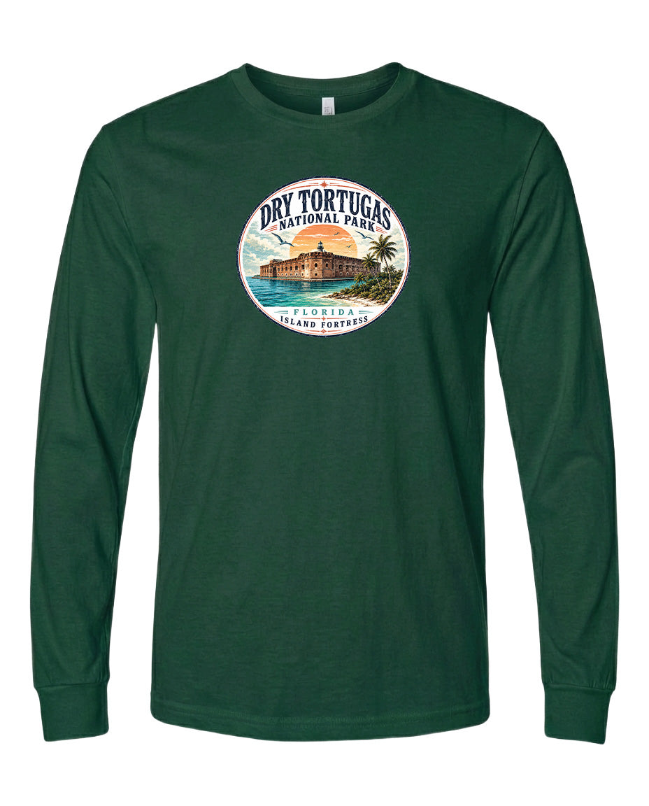 A green long-sleeved t-shirt with a circular graphic design featuring a tropical island landscape and a building.