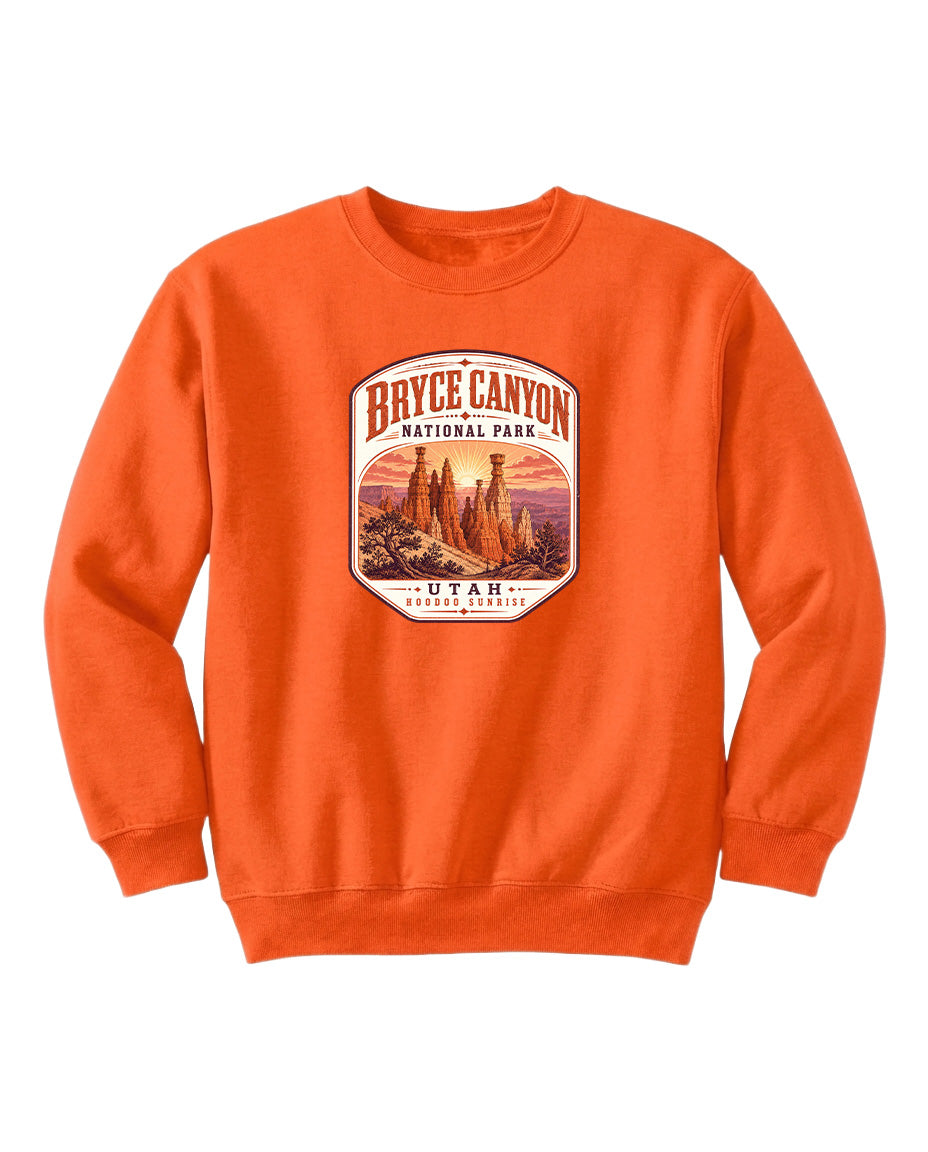 An orange sweatshirt with a graphic design depicting Bryce Canyon National Park and Utah.