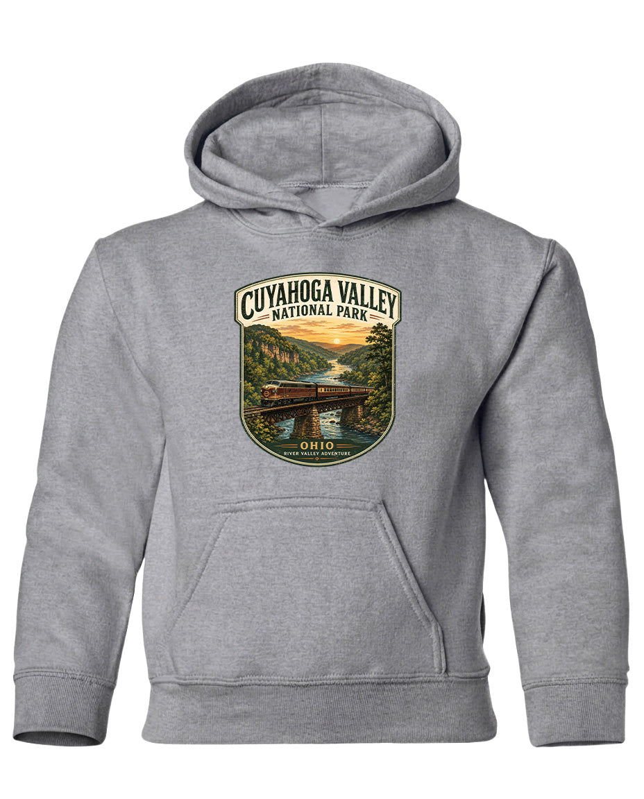 A gray hoodie with a graphic design depicting a scenic view of Cuyahoga Valley National Park, featuring a bridge and a river.