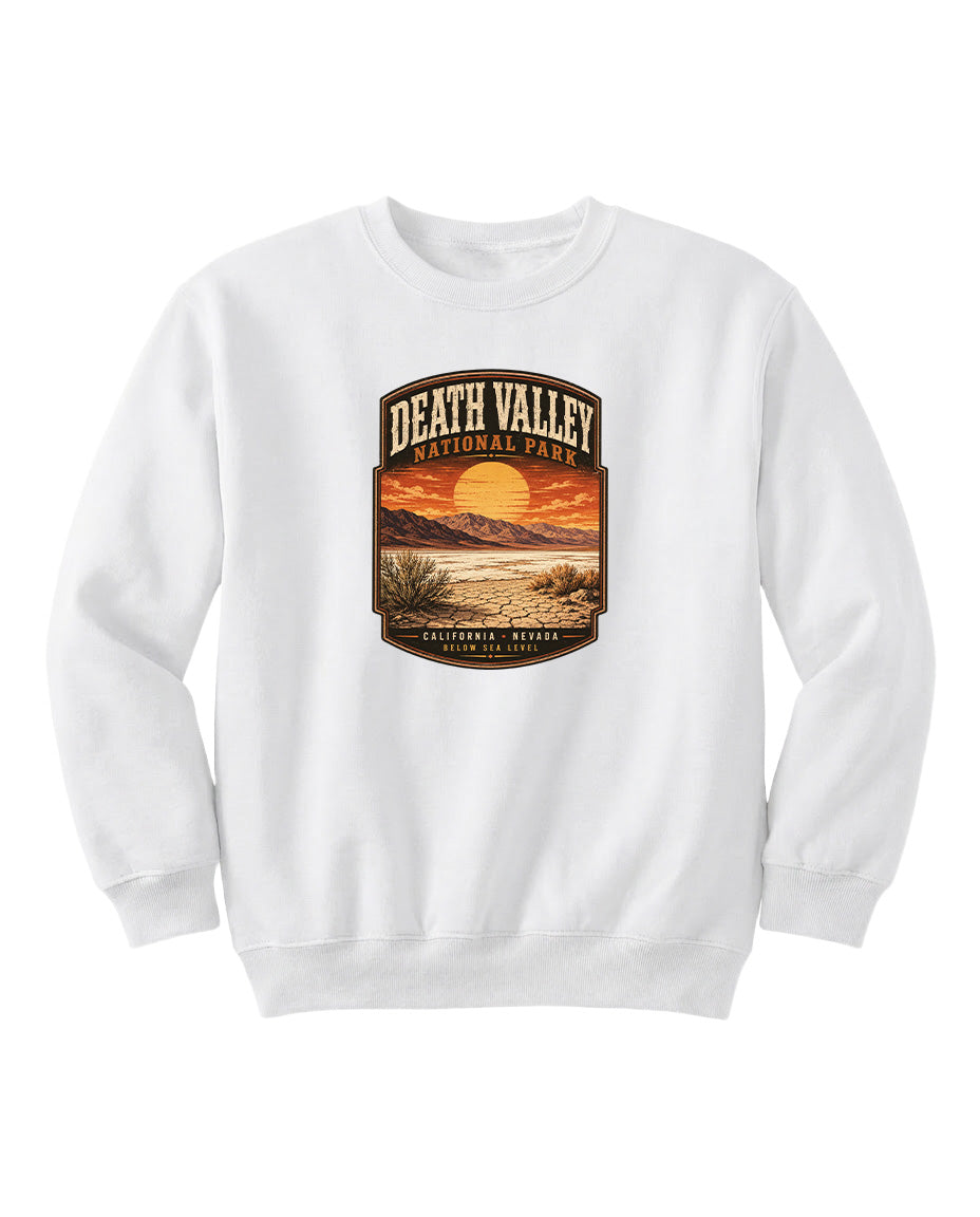 A white sweatshirt with a graphic design depicting a sunset over Death Valley National Park in California, Nevada.