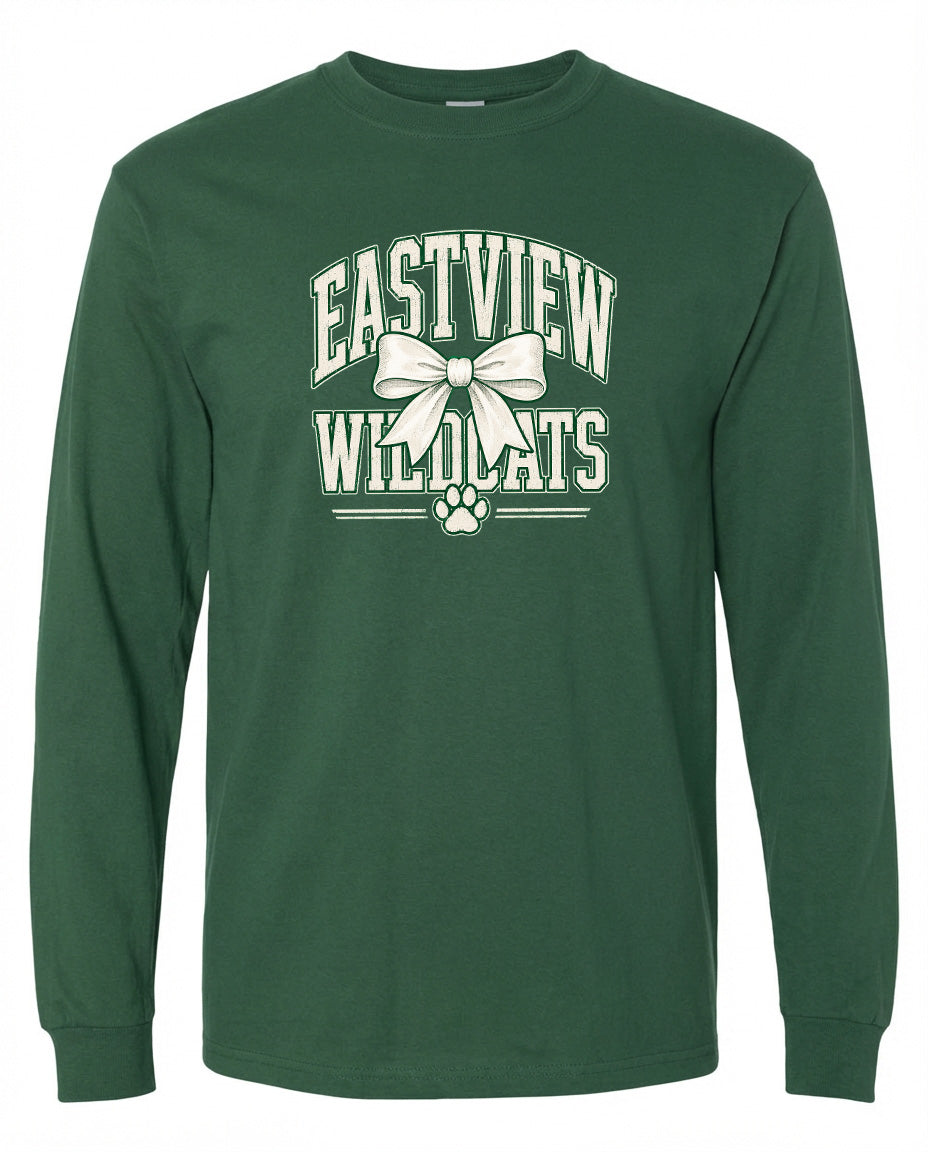 A green long-sleeved t-shirt with white text and a bow graphic printed on it.