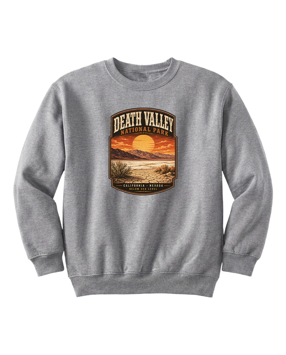 A gray sweatshirt with a graphic design depicting a sunset over Death Valley National Park.