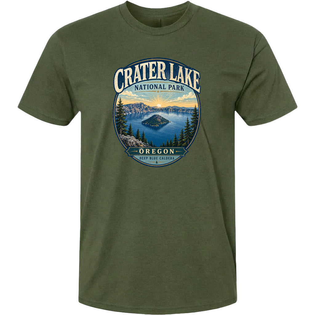 A green t-shirt with a graphic design depicting Crater Lake National Park in Oregon.