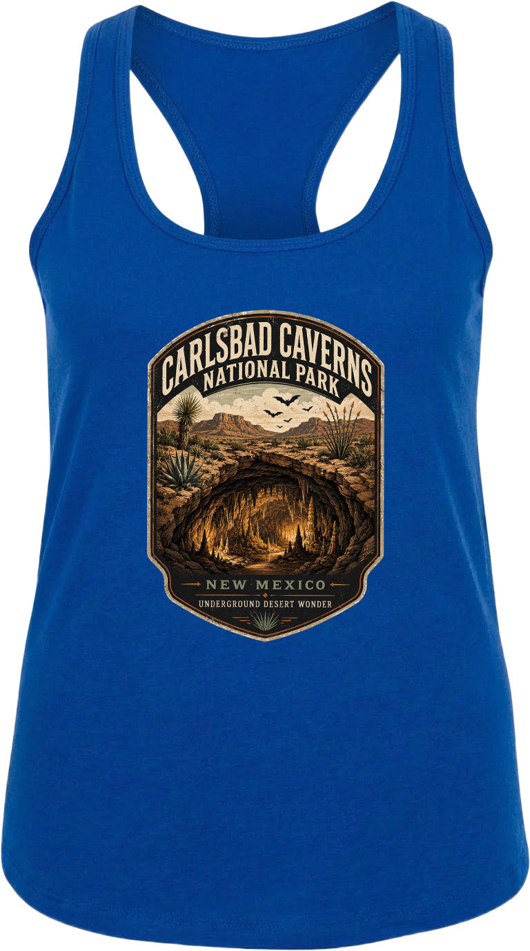 A blue tank top with a graphic design depicting the Carlsbad Caverns National Park in New Mexico, featuring a cave, desert landscape, and birds in flight.