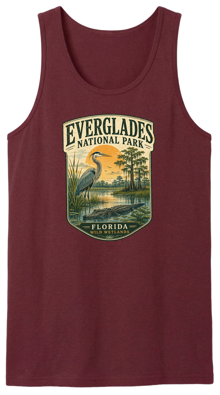 A red tank top with a graphic design depicting Everglades National Park, featuring a heron and a sunset landscape.