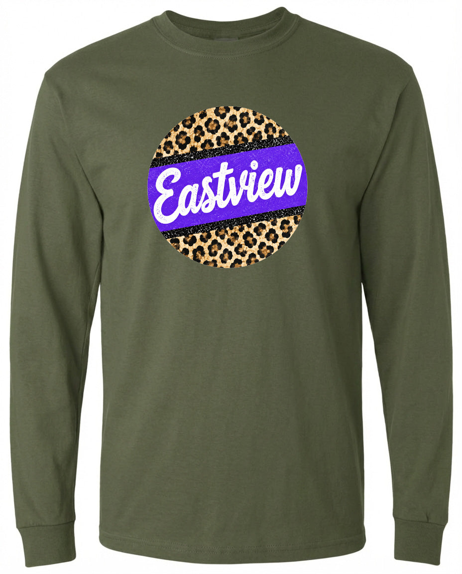 A long-sleeved olive green t-shirt with a circular graphic design on the front. The design consists of a leopard print pattern surrounding a purple stripe, and the word "Eastview" is written in white cursive letters.