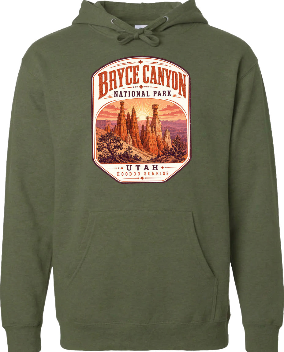 A green hoodie with a graphic design depicting the Bryce Canyon National Park in Utah.