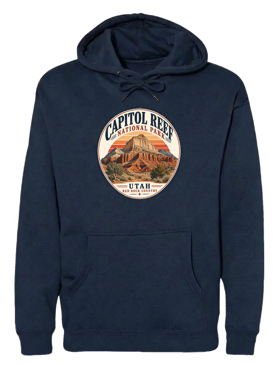 A navy blue hoodie with a circular design featuring the Capitol Reef National Park and Utah, which is a famous landmark in the United States.