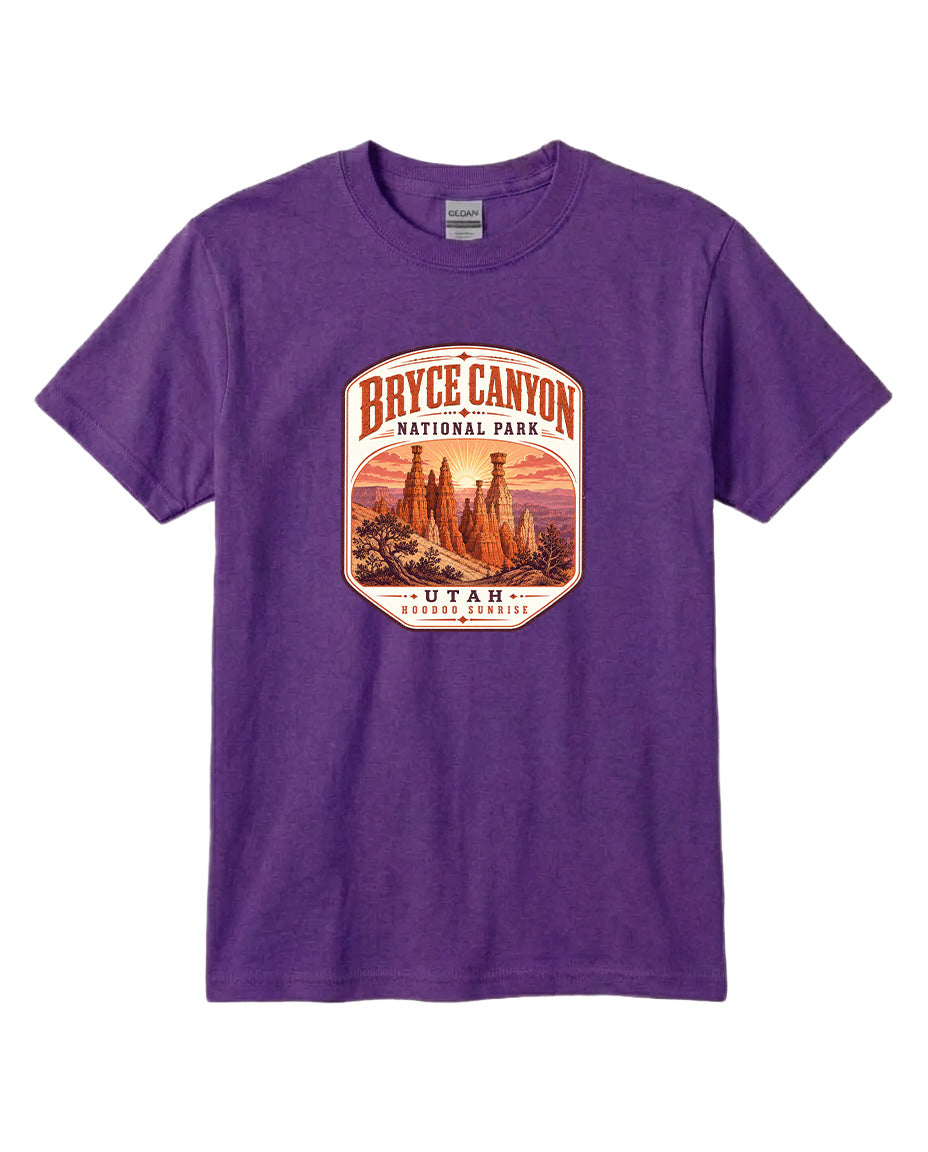 A purple t-shirt with a graphic design depicting the Bryce Canyon National Park in Utah.
