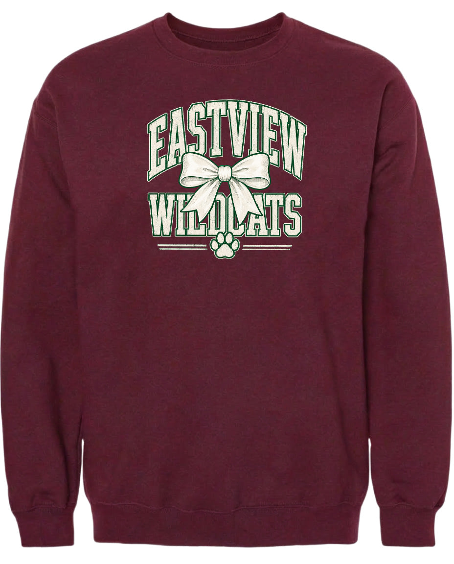 A burgundy sweatshirt with a graphic design featuring the text "EASTVIEW WILDLOTS" and a white bow.