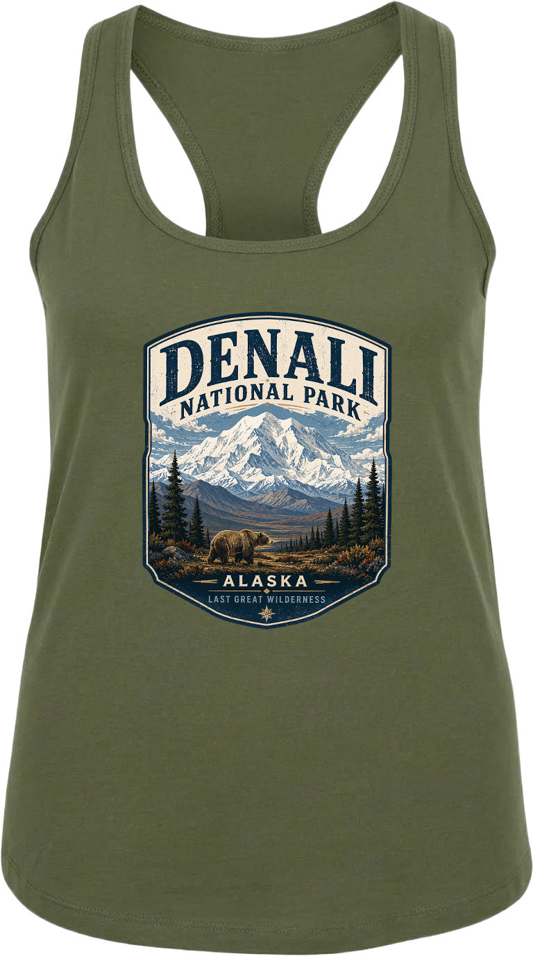 A green tank top with a graphic design depicting Denali National Park in Alaska, featuring a mountain landscape and a bear.