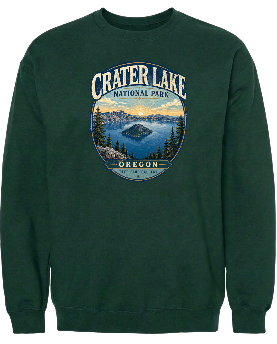 A green sweatshirt with a graphic design depicting Crater Lake National Park in Oregon.