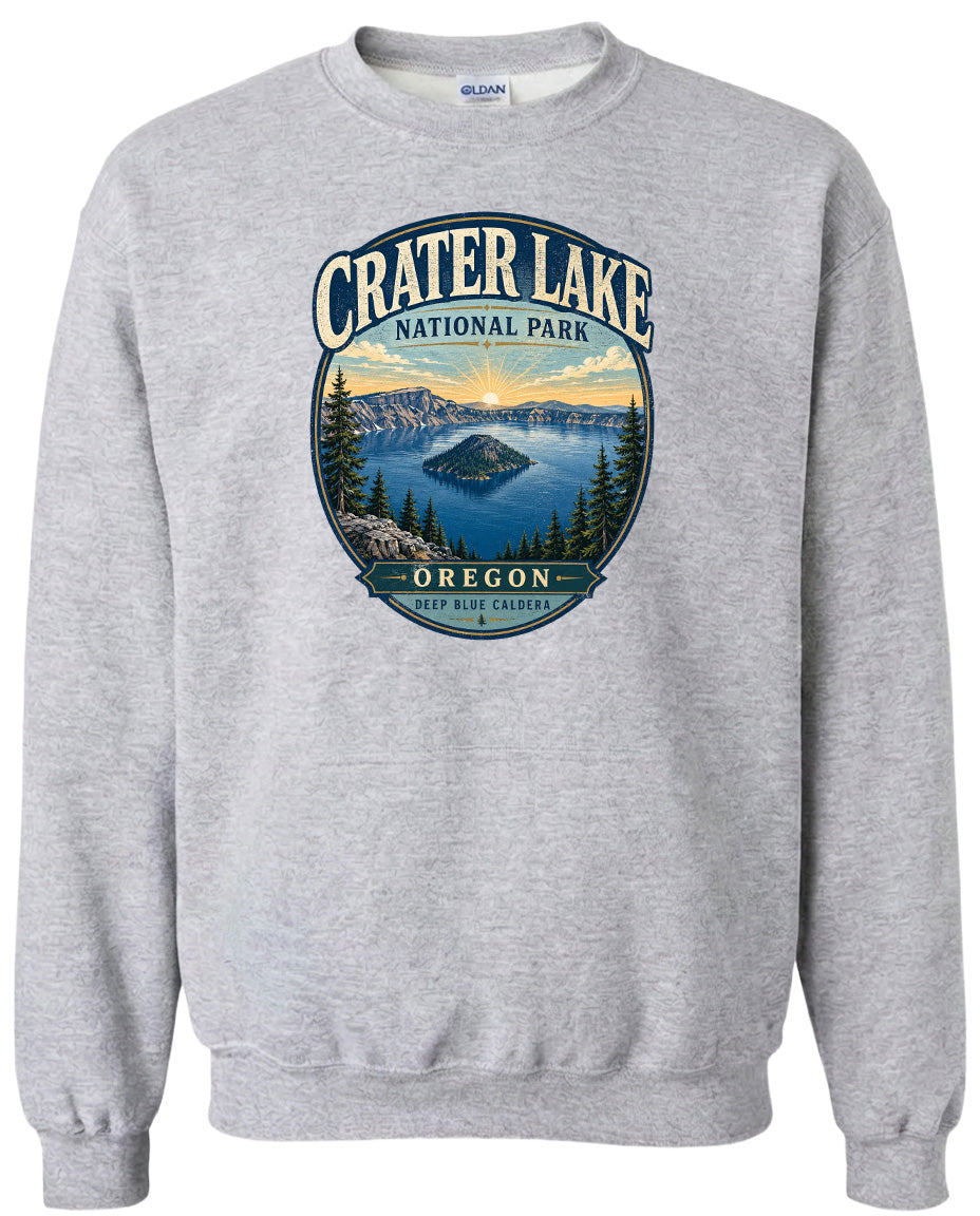 A gray sweatshirt with a graphic design depicting Crater Lake National Park in Oregon.