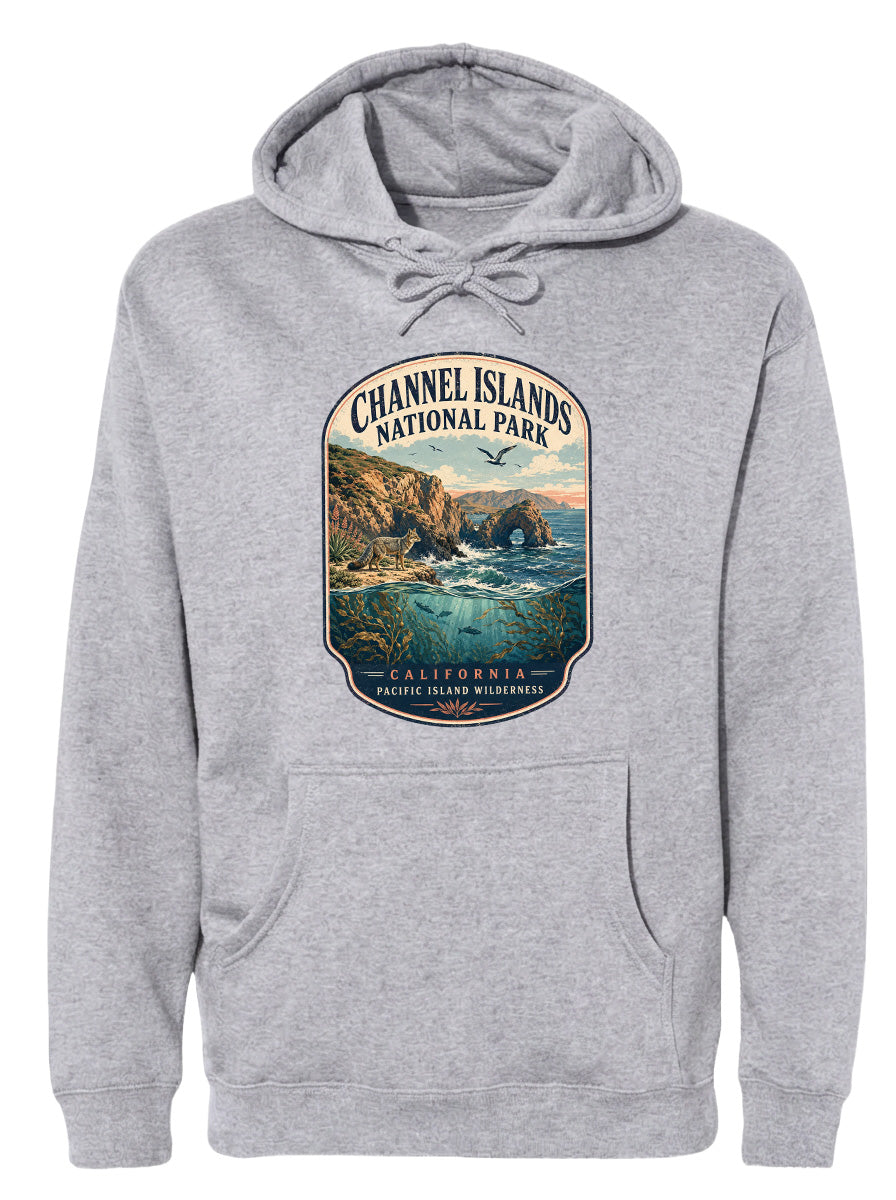 A gray hoodie with a graphic design depicting a scenic landscape featuring a coastal area, mountains, and a body of water.