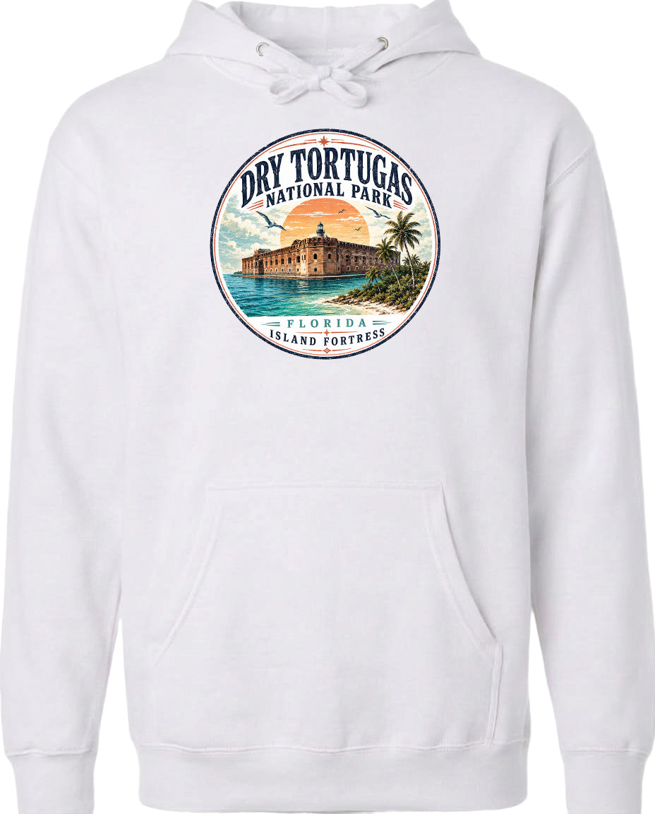 A white hoodie with a circular design featuring a tropical island and a building, along with the text "Dry Tortugas National Park, Florida Island Fortress".