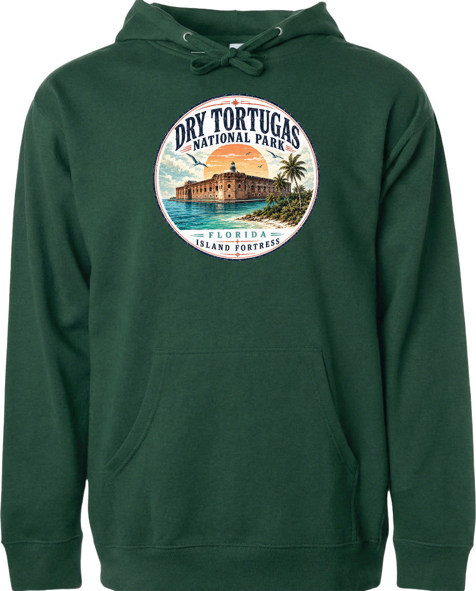A green hoodie with a circular design featuring a tropical island and a building, along with the text "Dry Tortugas National Park, Florida Island Fortress".