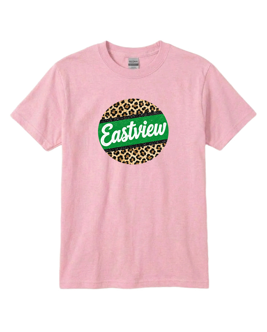 A pink t-shirt with a circular graphic design featuring a leopard print pattern and the word "Eastview" written in a stylized font.