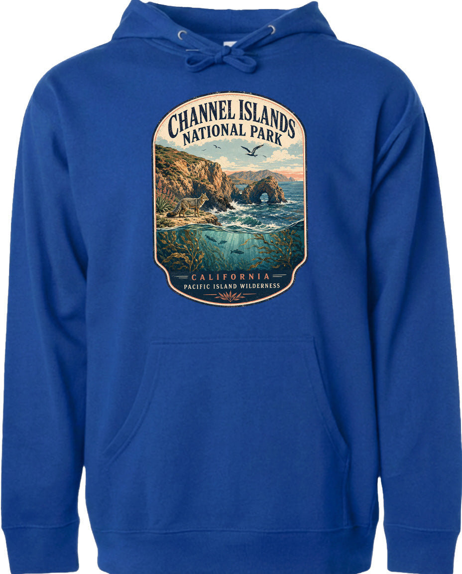 A blue hoodie with a graphic design depicting a scenic landscape featuring a rocky coastline, water, and a bird in flight.