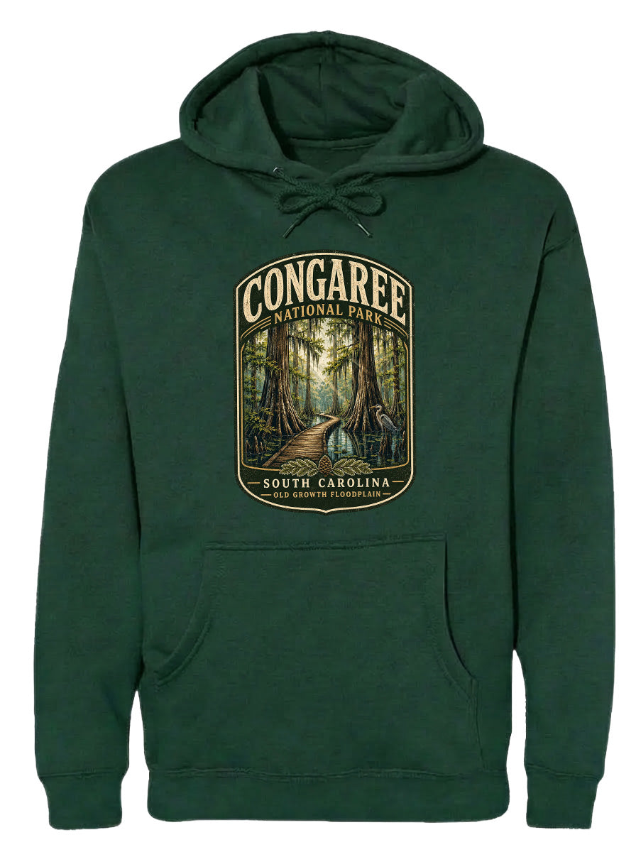 A green hoodie with a graphic design depicting a forest scene, specifically the Congaree National Park in South Carolina.