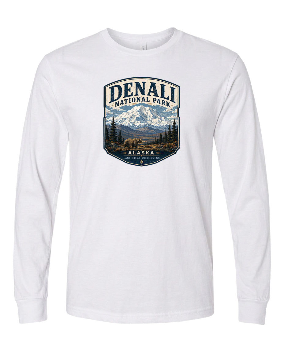 A white long-sleeved t-shirt with a graphic design depicting Denali National Park in Alaska.