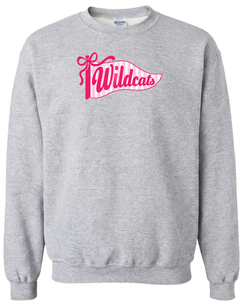 A gray sweatshirt with a pink and white banner design featuring the word "Wildcats" on it.