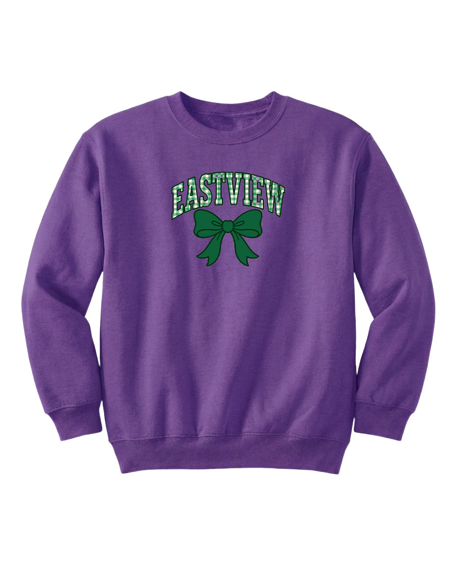 A purple sweatshirt with the text "EASTVIEW" and a green bow graphic printed on it.