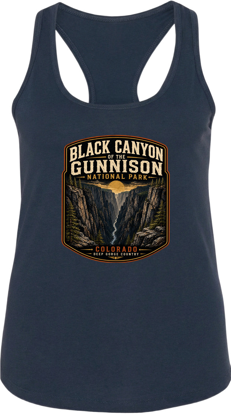 A graphic design on a dark blue tank top featuring a mountain landscape with a river, along with the text "BLACK CANYON OF THE GUNNISON NATIONAL PARK - COLORADO".