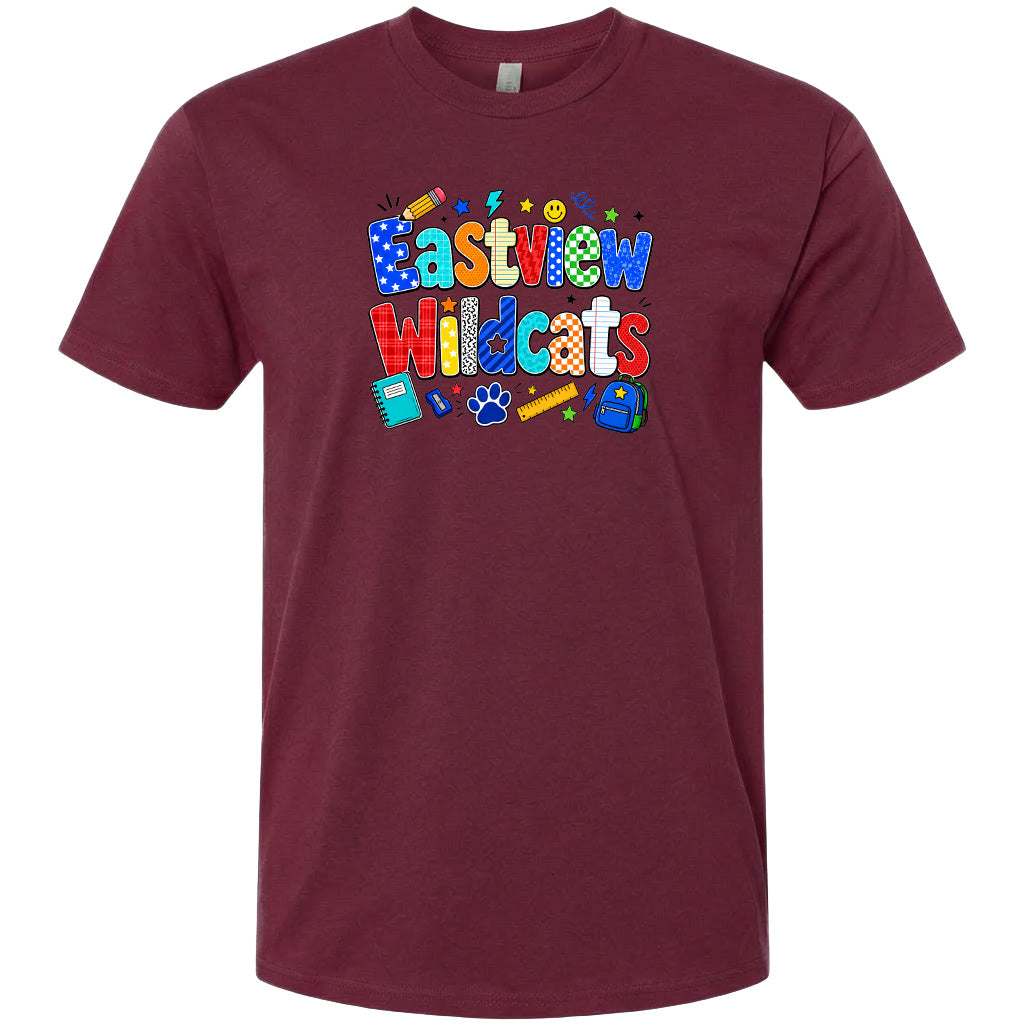 A burgundy-colored t-shirt with a colorful graphic design featuring the text "Eastview Wildcats" and various school-related icons such as a pencil, backpack, and book.