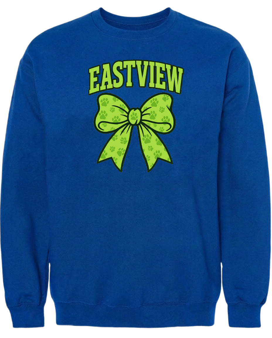 A blue sweatshirt with a yellow bow and paw prints printed on it.