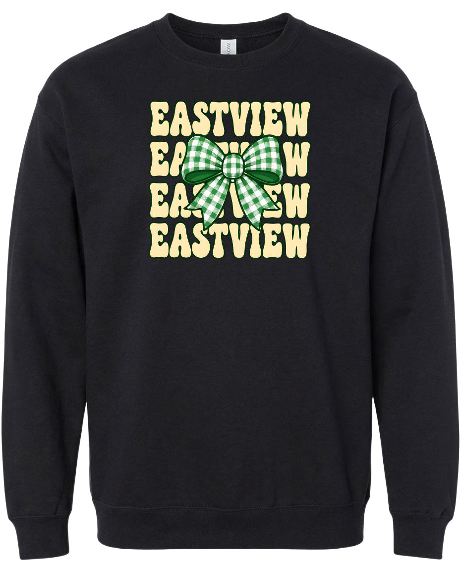 A black sweatshirt with a graphic design featuring a green and white checkered bow on the front.