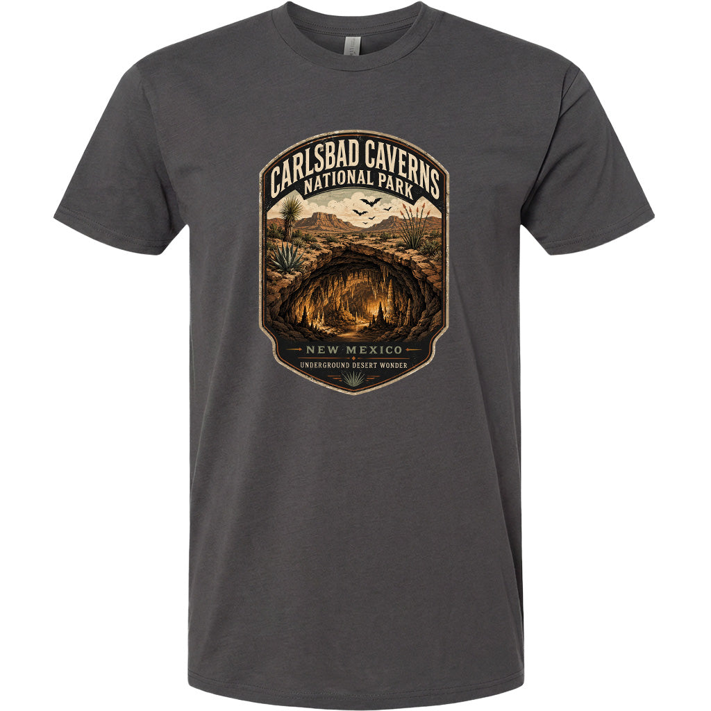 A gray t-shirt with a graphic design depicting the Carlsbad Caves National Park in New Mexico.