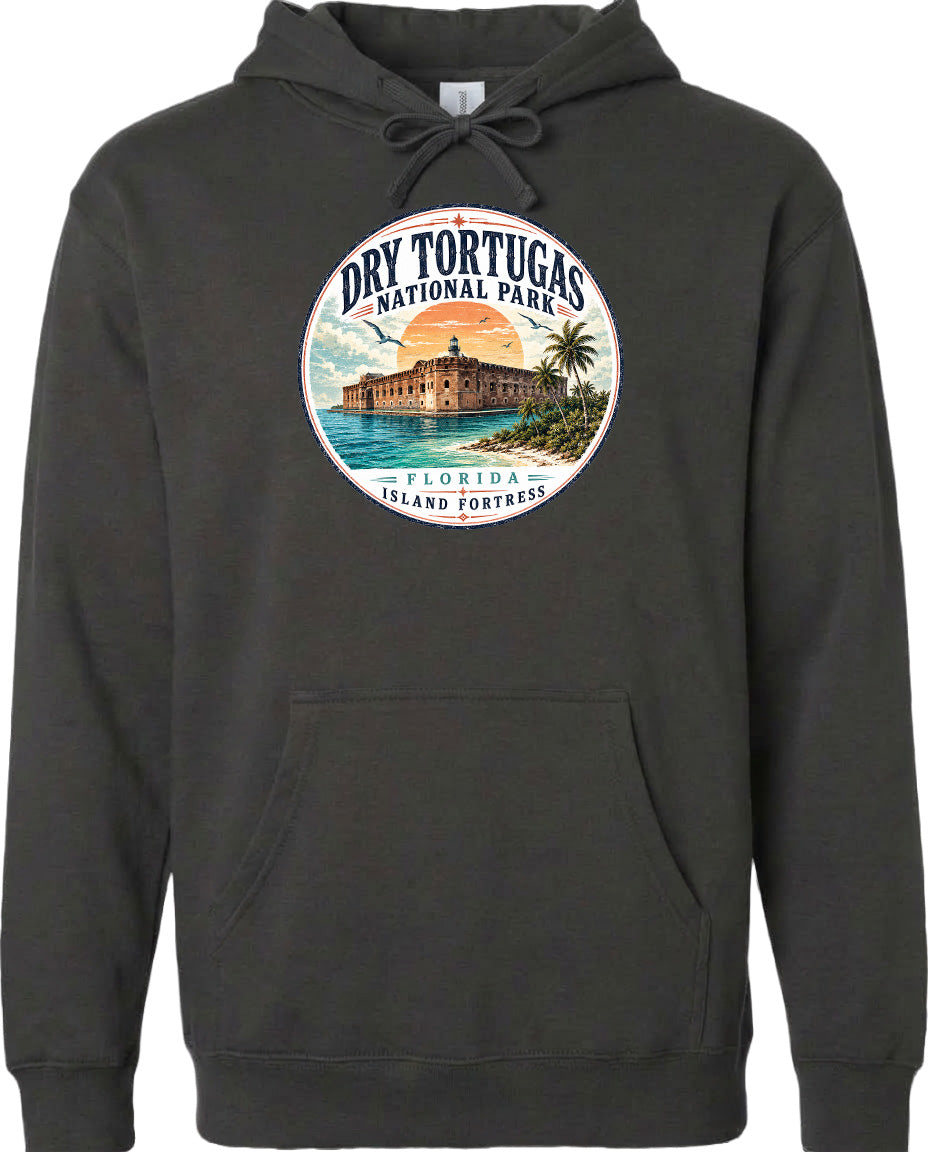 A hoodie with a circular design featuring a tropical island and a building, along with the text "Dry Tortugas National Park, Florida Island Fortress".