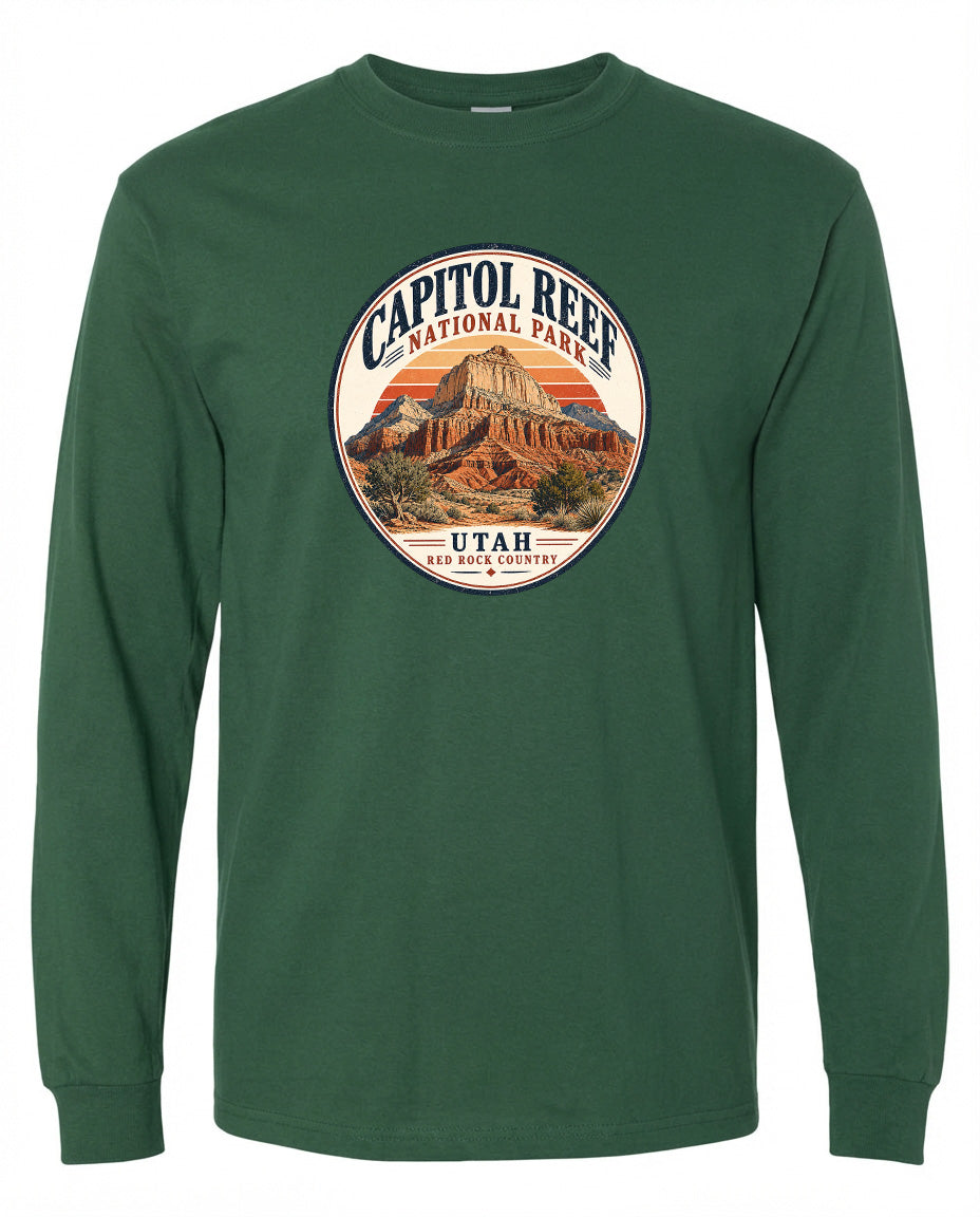 A green long-sleeved t-shirt with a circular graphic design featuring the Capitol Reef National Park in Utah.