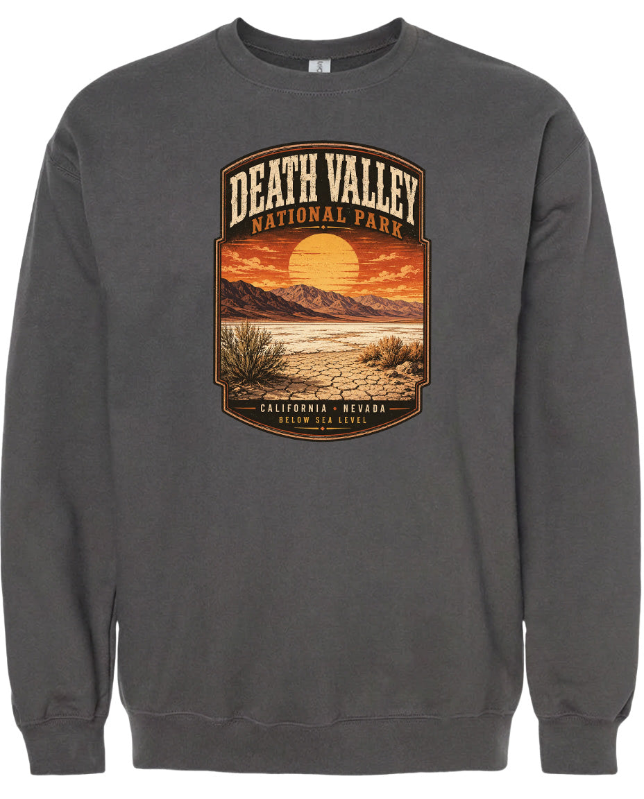 A gray sweatshirt with a graphic design depicting Death Valley National Park in California, Nevada, below sea level.