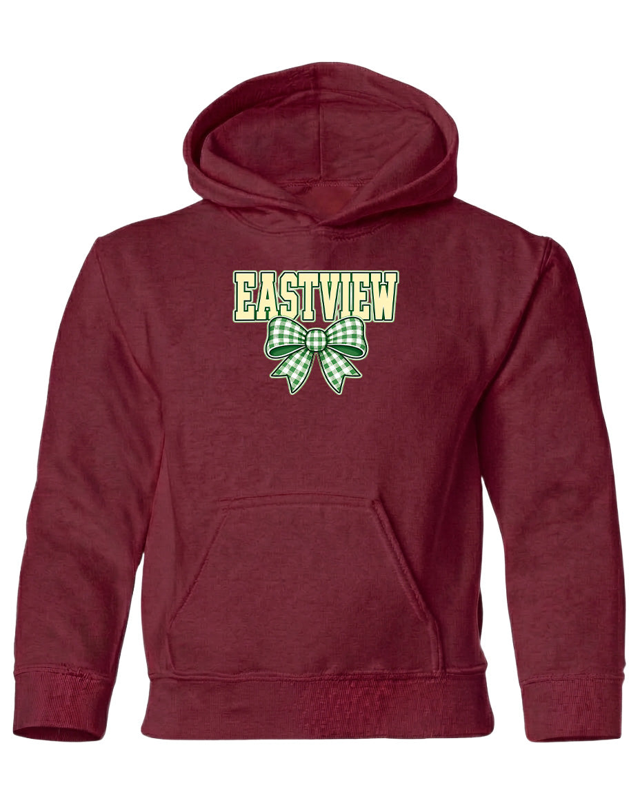 A maroon hoodie with a green and white bow on the front.