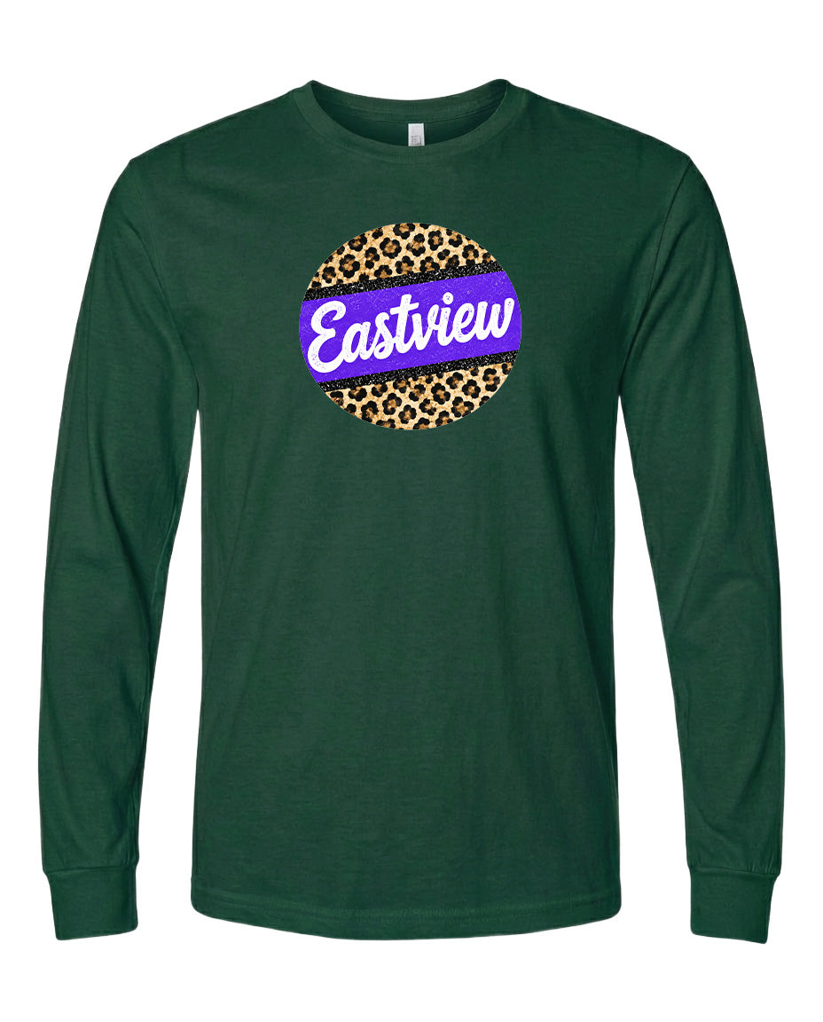 A green long-sleeved t-shirt with a purple and leopard print circular logo on the front.