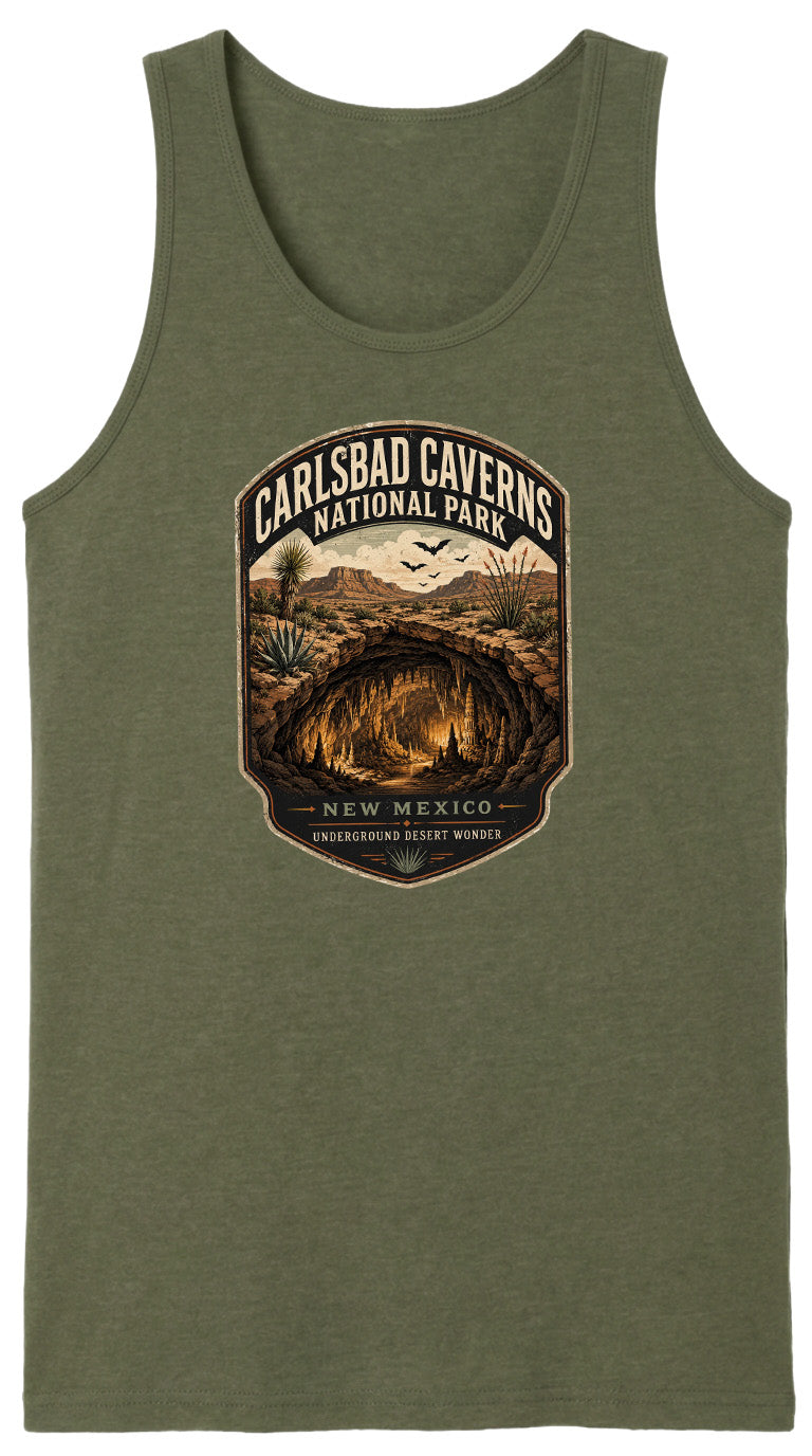 A green tank top with a graphic design depicting the Carlsbad Caves National Park in New Mexico, featuring a cave, desert landscape, and birds in flight.