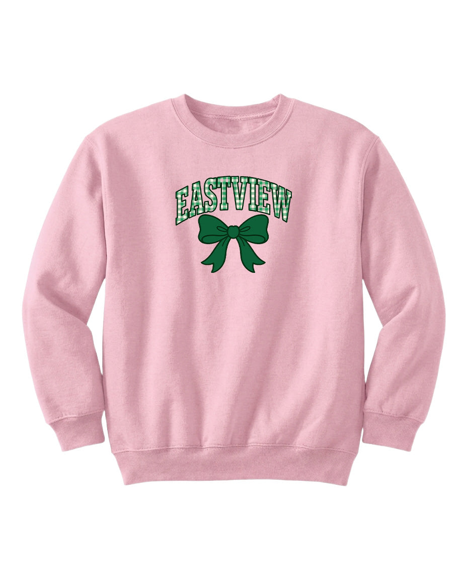 A pink sweatshirt with the word "EASTVIEW" and a green bow printed on it.