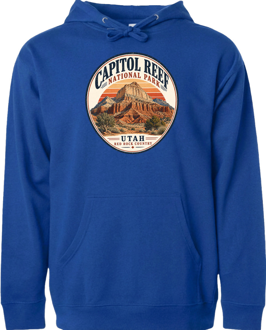 A blue hoodie with a circular design featuring the Capitol Reef National Park in Utah.