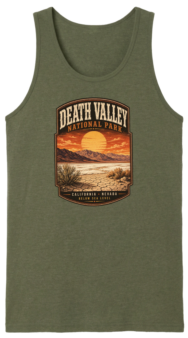 A graphic design on a green tank top depicting a desert landscape with mountains, a sunset, and the text "DEATH VALLEY NATIONAL PARK CALIFORNIA - NEVADA".