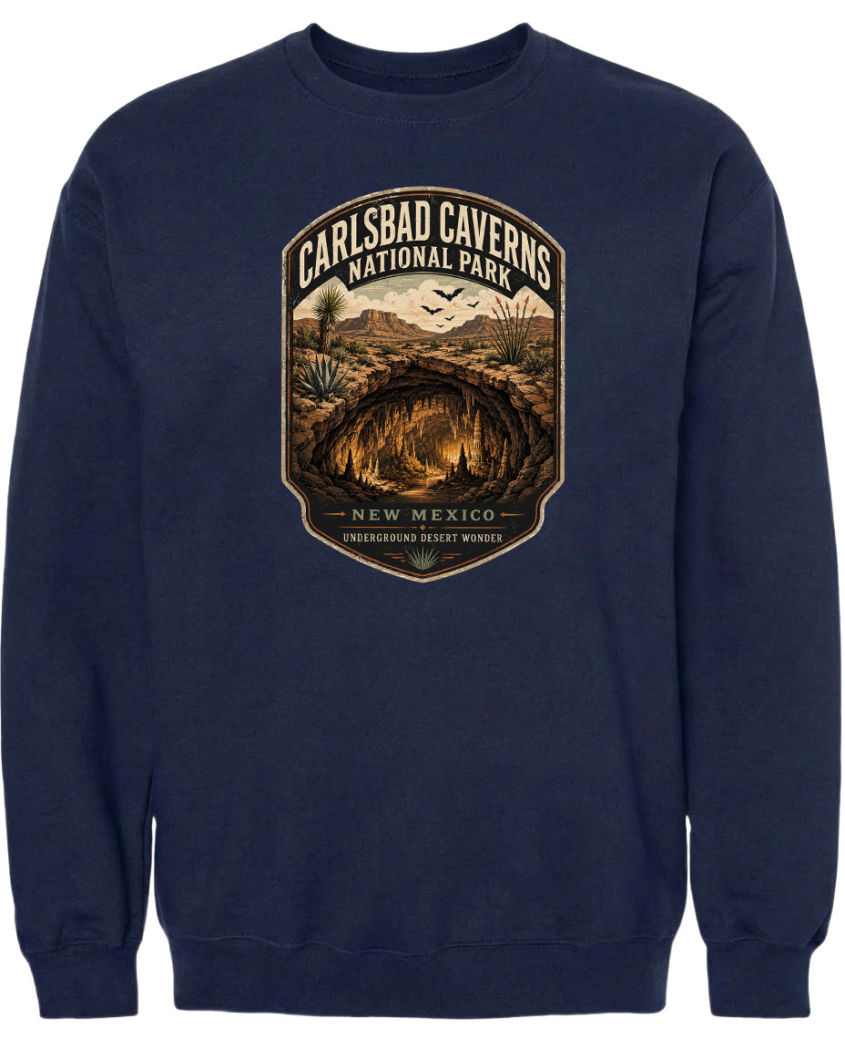 A navy blue sweatshirt with a graphic design depicting the Carlsbad Caves National Park in New Mexico.
