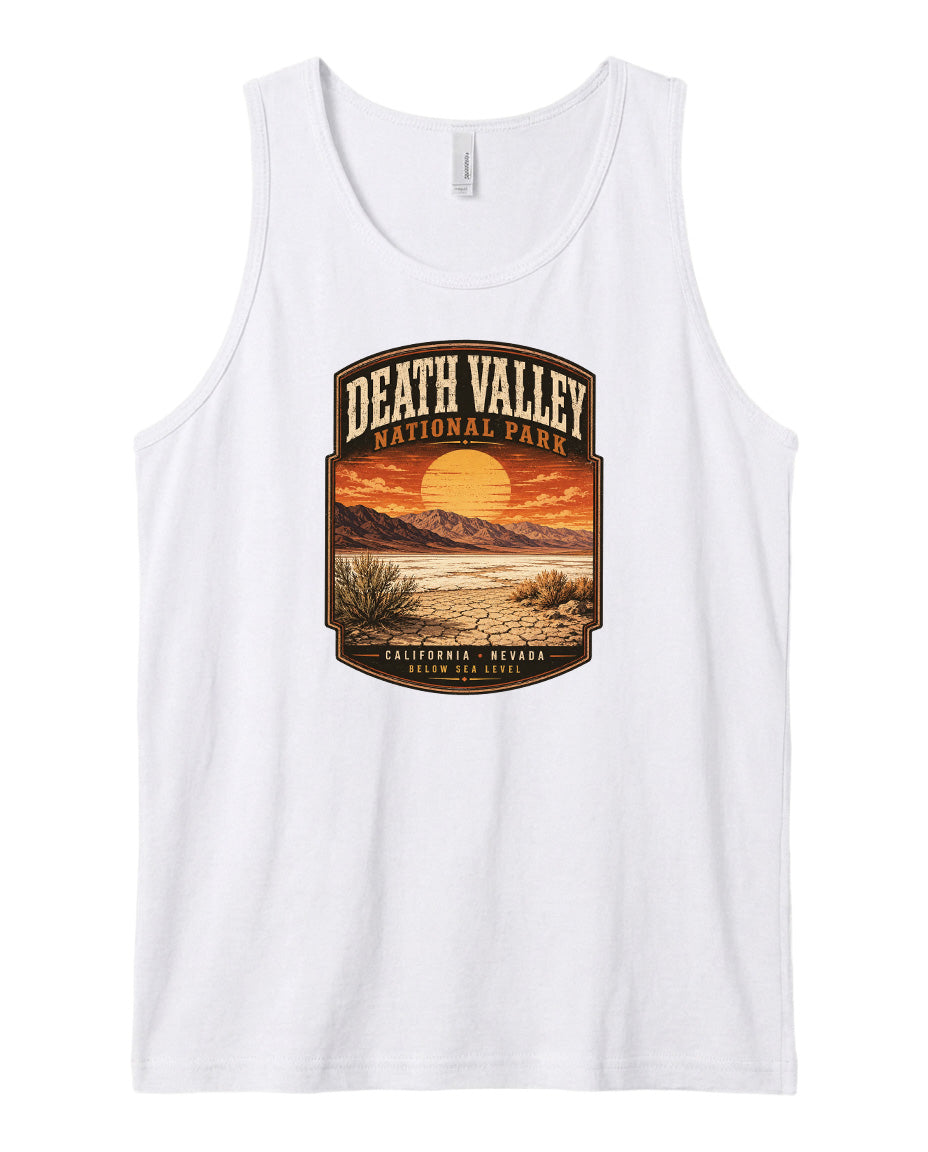 A white tank top with a graphic design depicting Death Valley National Park and its surrounding landscape, including a sunset over the desert.
